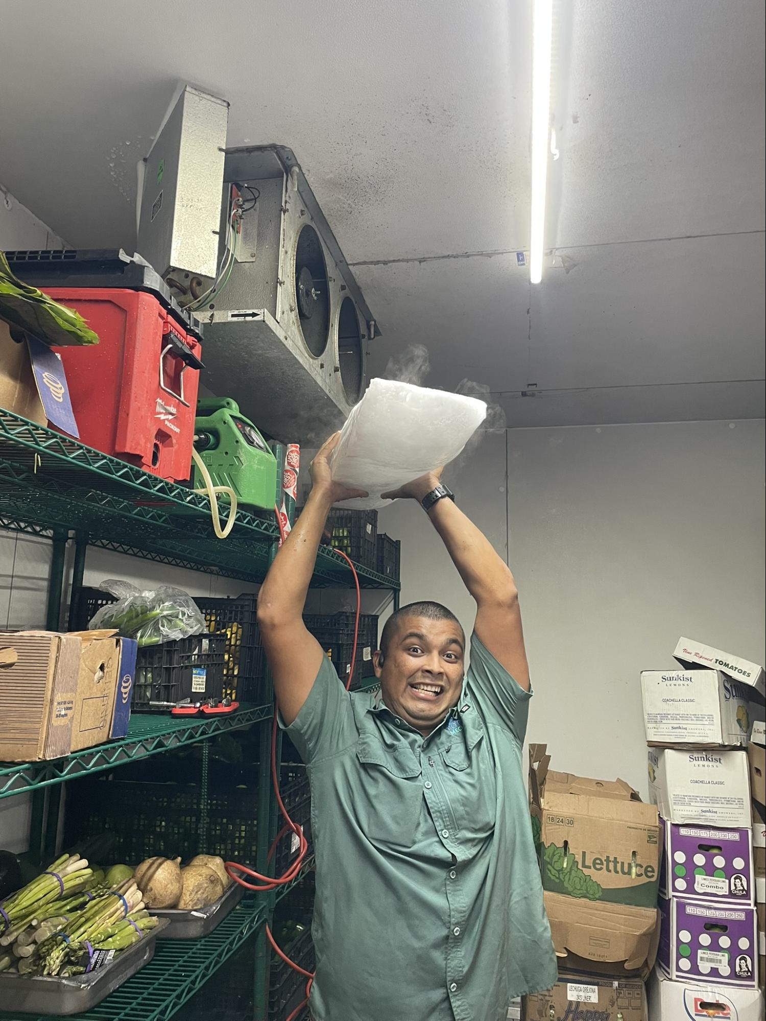 Our team maintaining a Walk-In Cooler